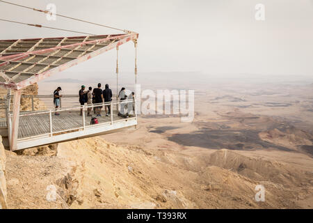Mitzpe Ramon, Israel - 22 november, 2016: People on observation terraсe at the crater Ramon at  Negev desert, Israel Stock Photo