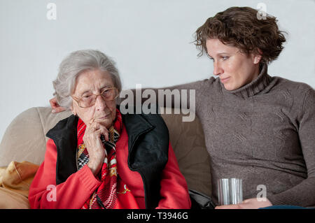 Young woman with senior woman Stock Photo