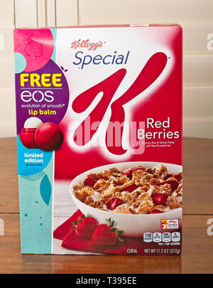 A box of Special K Red Berries with EOS Lip Balm Stock Photo