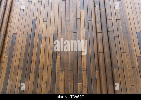 beautifully crafted from the harmful effects of the environment, water and sunlight and brown colored natural wood structures, part of the building wa Stock Photo