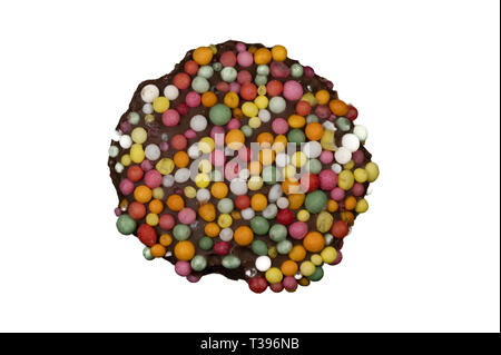 Macro image of a 'freckle', chocolate bud coated in sprinkles, isolated on a white background Stock Photo