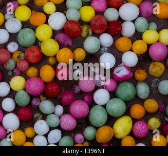 Macro image of a 'freckle', chocolate bud coated in sprinkles Stock Photo