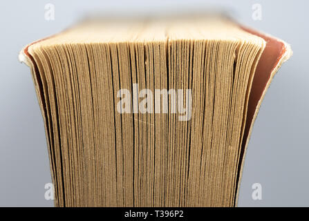 Close up image of worn corner of pages of a book. Stock Photo