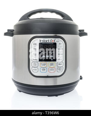 Winneconne, WI -  7 April 2019: An Instant Pot cooking appliance on an isolated background Stock Photo