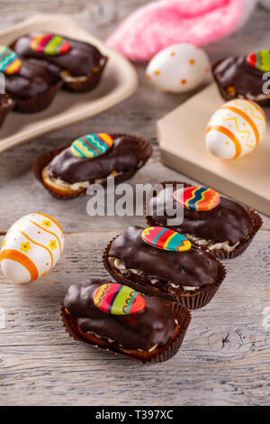 Easter party food: mini cakes decorated with chocolate egg Stock Photo