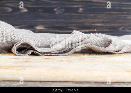 Natural linen tablecloth on a wooden table, Rustic life Stock Photo