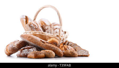 Composition with assorted bakery products in wicker basket isolated on white Stock Photo