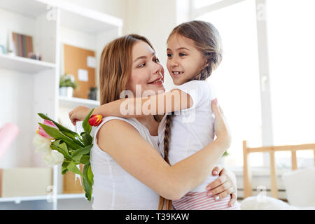 Mother and Daughter Embracing Stock Photo