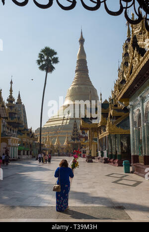 pilgrim with offering  at the Shwedagon Pagoda, officially named Shwedagon Zedi Daw and also known as the Great Dago Stock Photo