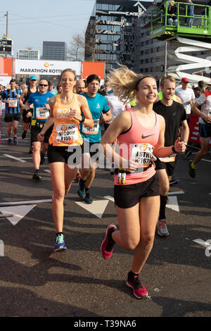 Rotterdam, The Netherlands. 07th Apr, 2019. Happy young people running marathon. Stock Photo