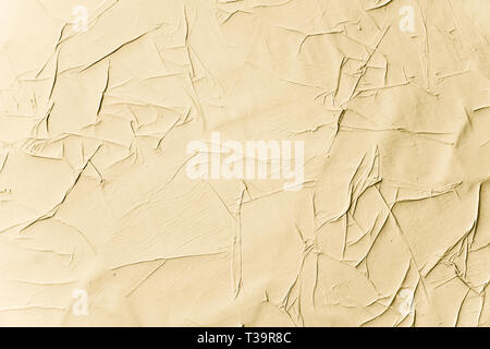 Crumpled creased posters grunge paper textures. Blank old ripped torn street billboard posters background. Stock Photo