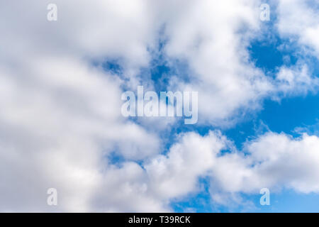 Cloud sky background. Beautiful cotton clouds floating in sunset sky.  Dramatic atmospheric mood. Beauty in nature Stock Photo - Alamy