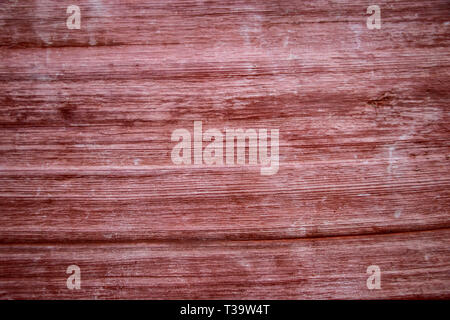 Red grunge wood background. The texture of the red paint from fading Stock Photo