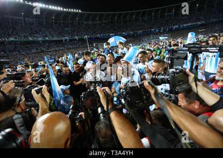 Buenos Aires, Argentina - April 07, 2019: Lisandro Lopez (Racing) rising the Superliga Cup 2019 and kissing it with his teammates in the Juan Domingo  Stock Photo