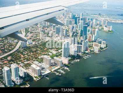 Aerial view of city of Miami flying in over city. Stock Photo