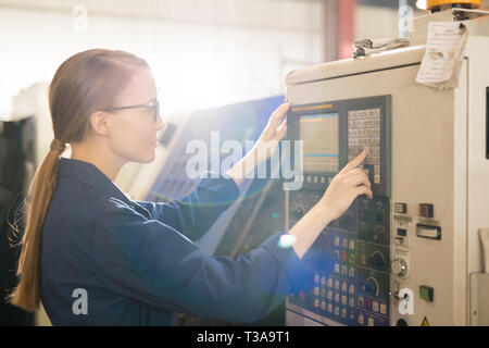 Pressing button on panel Stock Photo