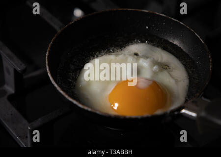 fried egg in saucepan Stock Photo