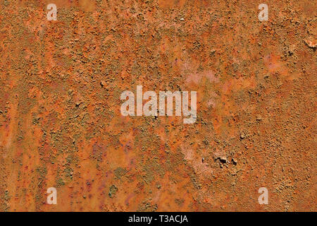 A brownish orange section of oxidized metal. Stock Photo