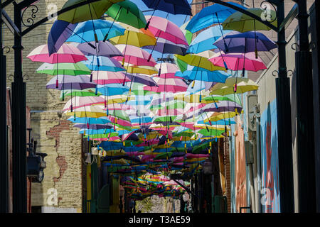 Colorful umbrellas hanging in the famous Orange Street Alley at Redlands, California Stock Photo