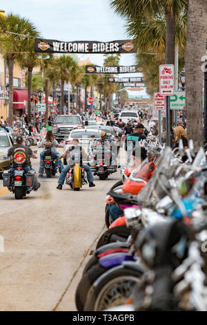 Daytona Beach, FL - 12 March 2016: Bikers cruising along Main Street during the 75th Annual Bike Week at the World's Most Famous Beach. Stock Photo