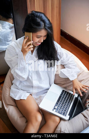 Pretty woman talking on phone Stock Photo