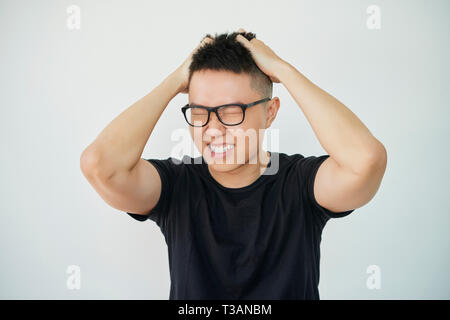Man suffering from headache Stock Photo