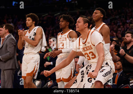 April 04, 2019: Texas Longhorns forward Kamaka Hepa (33) and the bench are excited at the final of the NIT Tournament game between The Texas Longhorns and The Lipscomb Bisons at Madison Square Garden, New York, New York. Mandatory credit: Kostas Lymperopoulos/CSM Stock Photo