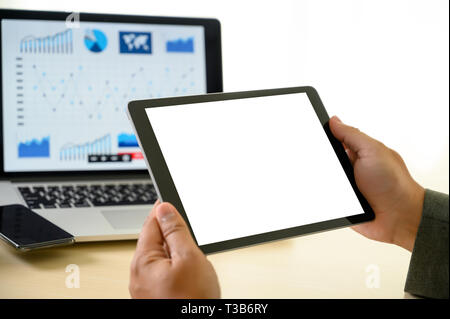 man  hands multitasking man using tablet close up close up working in office Stock Photo