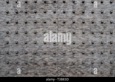 Cube brick stone block on the wall with the tile and seamless pattern. Stock Photo