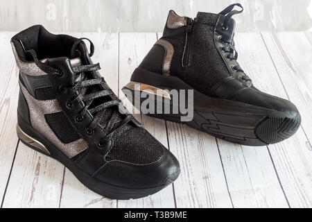 Comfortable boots with lacing and zip closure. Stock Photo