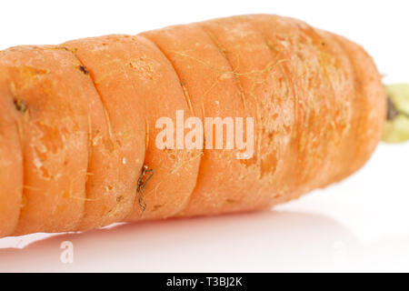 Closeup of one half of fresh orange carrot isolated on white background Stock Photo
