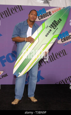 LOS ANGELES, CA. August 12, 2001: Actor DWAYNE JOHNSON, aka The Rock, at the 2001 Teen Choice Awards at the Universal Amphitheatre, Hollywood.  He won the award for Choice Sleazebag for his role in The Mummy Returns. © Paul Smith/Featureflash Stock Photo