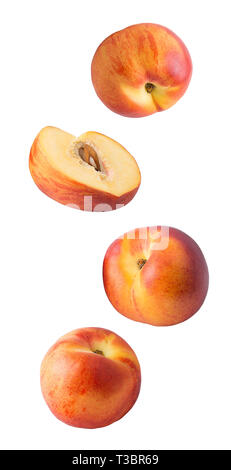 Flying peach and raspberry fruits isolated on white background with clipping path as package design element and advertising. Stock Photo