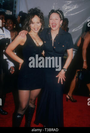 LOS ANGELES, CA - MARCH 15: Actress Rosie Perez and singer Madonna attend the Eighth Annual Soul Train Music Awards on March 15, 1994 at the Shrine Auditorium in Los Angeles, California. Photo by Barry King/Alamy Stock Photo Stock Photo