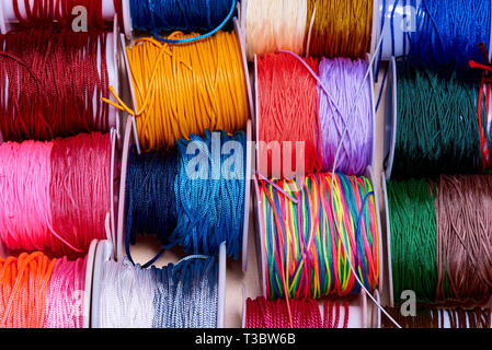 Collection of bright multi-colored ropes close-up. Stock Photo