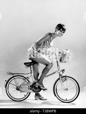 woman on bicycle legnano, italy 1969 Stock Photo