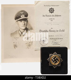 Captain Willi Göttert, decorations and documents German Cross in Gold. Heavy issue with six full rivets and long, slender attachment needle (Nie 7.04.10 f). Chipped, the interior of the award case replaced, with the preliminary possession document dated 14 May 1944. Iron Cross 1st Class of 1939 with award document and transmittal letter, Army Close Combat Clasp in Silver, silvered fine zinc issue of people, 1930s, 1980s, 20th century, 20th century, infantry, military, armed forces, militaria, object, objects, stills, clipping, clippings, cut out, cut-out, cut-outs, document, Editorial-Use-Only Stock Photo