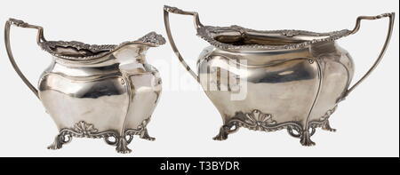 A silver tea service, James Dixon & Sons, Sheffield, circa 1900 Sterling silver. Service consisting of a tray, tea pot, sugar bowl and creamer. The vessels in a curved shape with lavishly profiled rims, English baroque style. All parts with English hallmarks and manufacturer's mark Dixon & Sons, next to it importer's stamp 'Gebr. Friedländer' (Berlin) and German mark of fineness '925'. Width of the tray 60.5 cm, total weight 3980 g. historic, historical, 1900s, 20th century, 19th century, handicrafts, handcraft, craft, object, objects, stills, cl, Additional-Rights-Clearance-Info-Not-Available Stock Photo