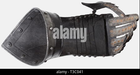 A pair of German black and white fingered gauntlets, circa 1580 Articulated metacarpus of five lames with raised cabled knuckle protection. Articulated finger defences and hinged thumb plates. Pointed cuffs set with turned under and roped edge. An armoury mark consisting of three dots at the edge. Length 35 cm each. historic, historical, 16th century, defensive arms, weapons, arms, weapon, arm, fighting device, object, objects, stills, clipping, clippings, cut out, cut-out, cut-outs, utensil, piece of equipment, utensils, plating, armour-plating,, Additional-Rights-Clearance-Info-Not-Available Stock Photo