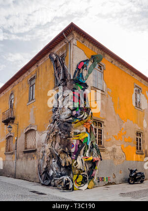 Half Rabbit by Bordalo II is a street art installation in Porto ...