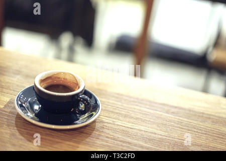a glass of Espresso Shot on the wooden table Stock Photo