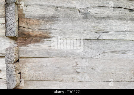 Old white oak wood for background or old grey wooden texture. Wooden beams. Surface eroded by time. More than a hundred years old wood. Old wood backg Stock Photo