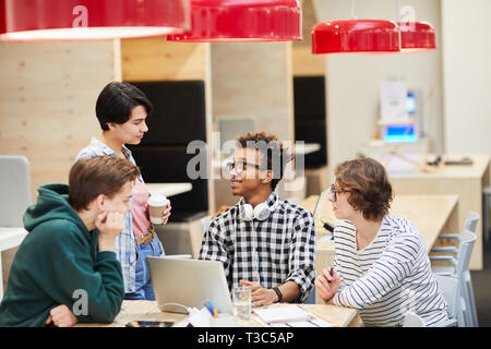 Students in modern cafe Stock Photo