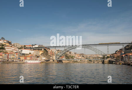 The double decked arched Dom Luis I Bridge across the River Douro in Porto, Portugal. Stock Photo