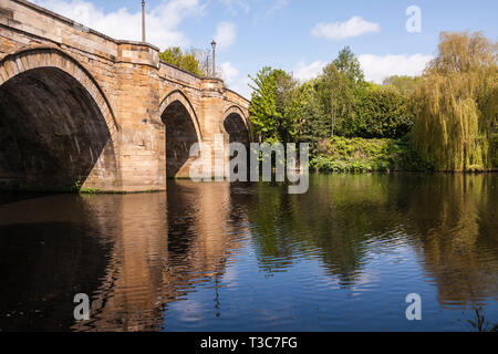 A scenic view of the River Tees at Yarm  showing the  bridge and tree lined river banks Stock Photo