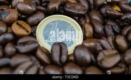 fair trade coffee Price - roasted coffee beans and money Stock Photo
