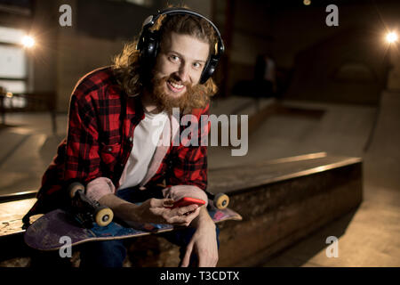 Contemporary Man Listening to Music Stock Photo