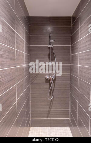 Brown tile for walk-in shower modern bathroom Stock Photo