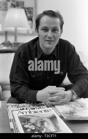 Nick Ashley when he was Head of Design at Laura Ashley, sitting in his office in London, UK 1988 Stock Photo