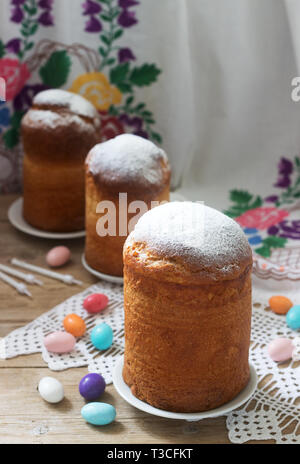 Traditional homemade Easter cake in the Easter decoration. Rustic style, selective focus. Stock Photo